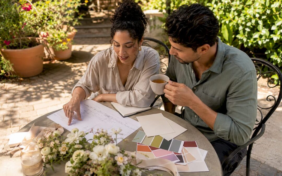 Couple planning personalised ceremony at table