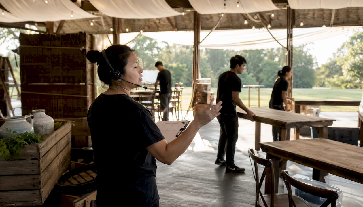 Event coordinator managing onsite logistics