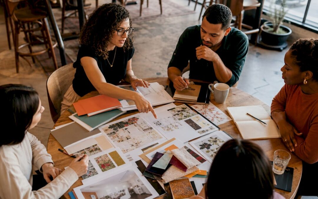 Event planner and team reviewing event layouts