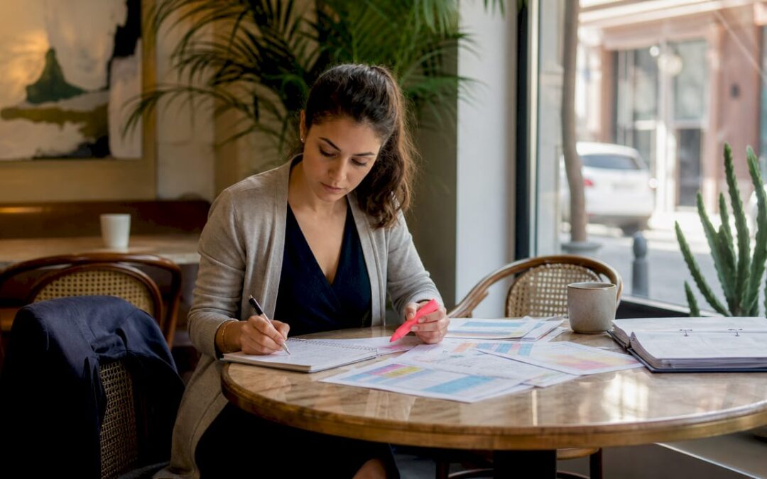 Event planner reviewing budget documents