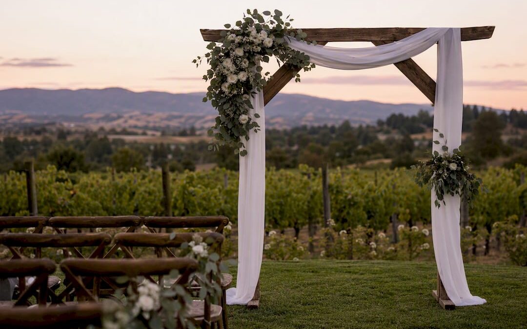 Simple elegant floral wedding arch with eucalyptus