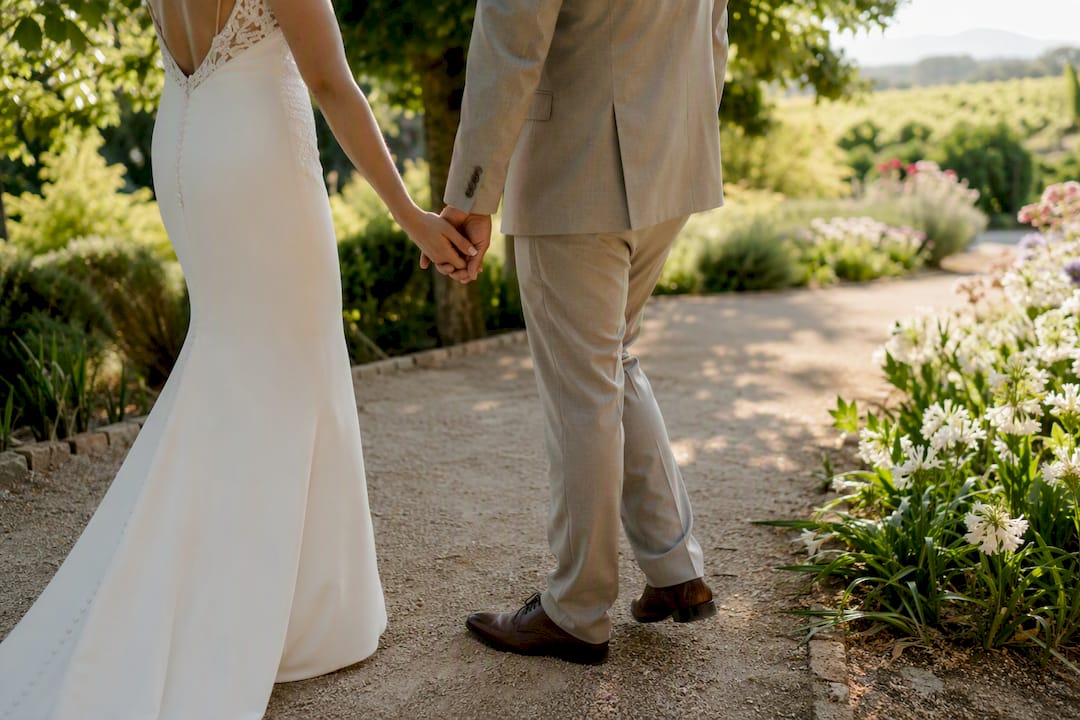 Wedding couple walking quietly outdoors