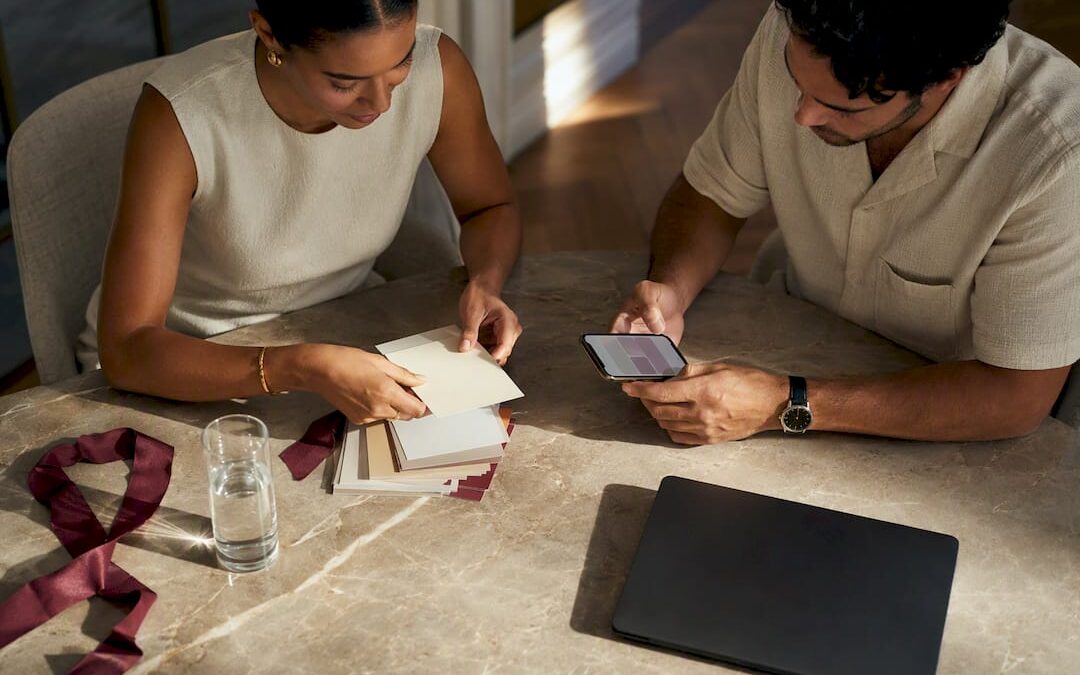 Couple coordinating printed and digital wedding checklist